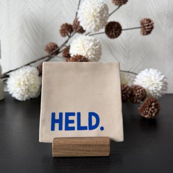 Held, beige, blauw 